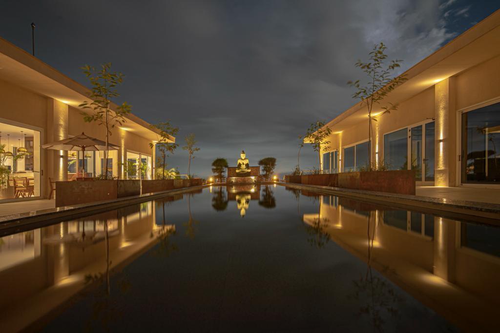 Reflection pool with Buddha statue